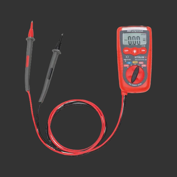 Digital multimeter with red and black probes on a white background