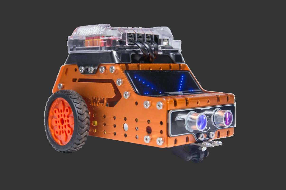 Orange toy car with solar panel on a white background