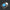 Button module with blue button on a white background