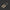 Two wooden tools with black handles on a white background