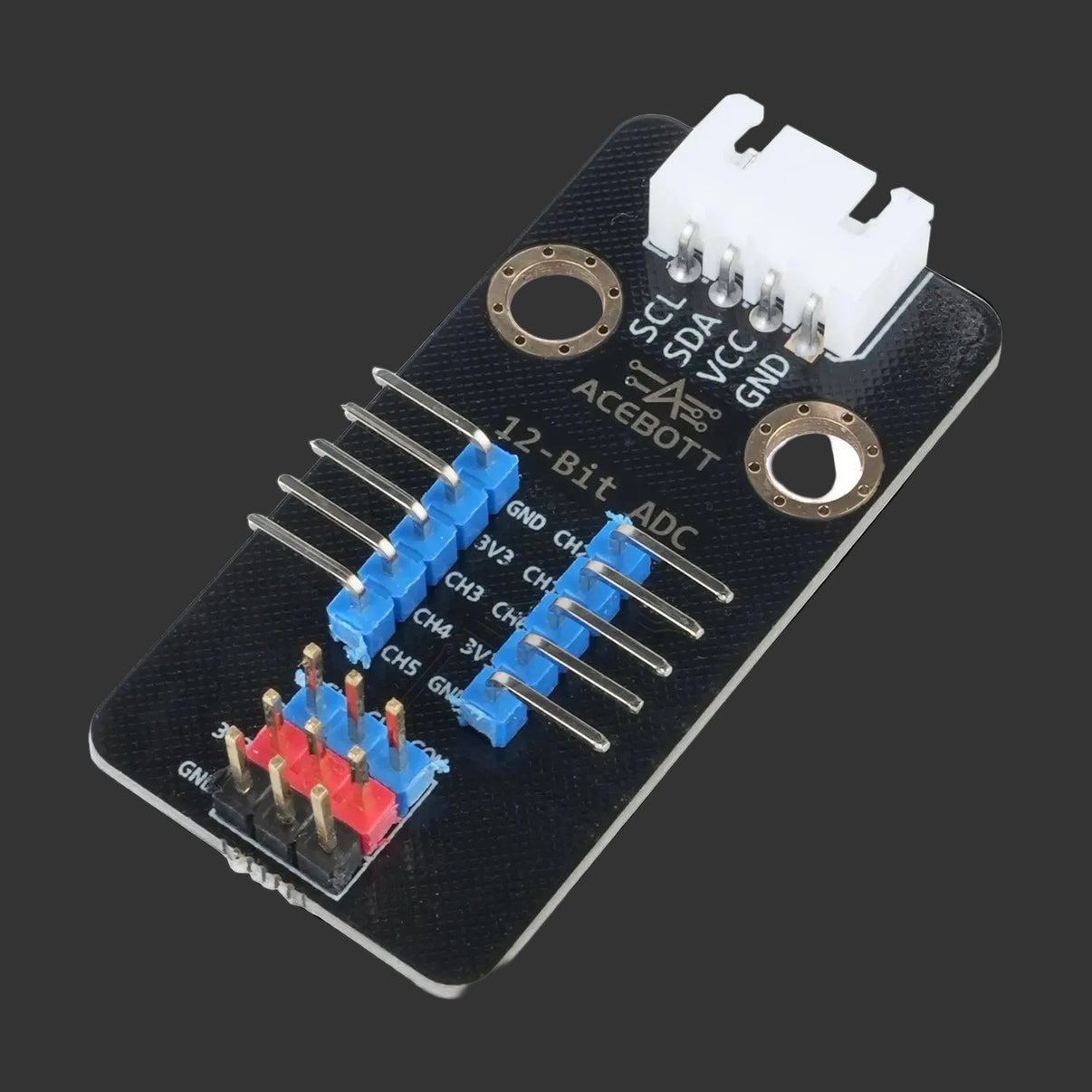 Electronic component board with labeled pins on a black background