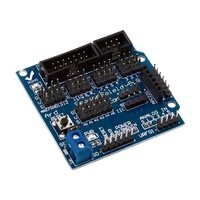 Electronic circuit board with various components on a white background